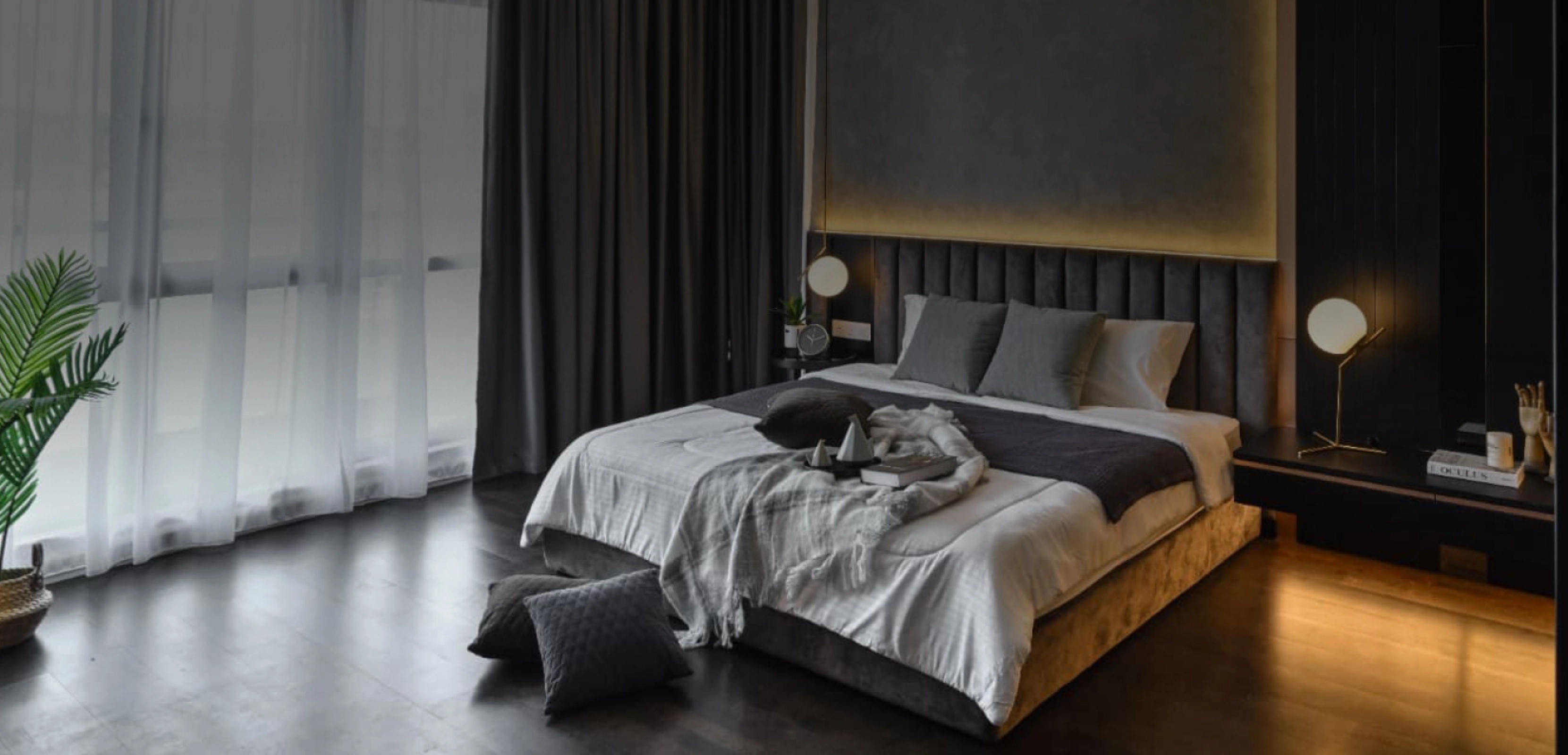 Bedroom with built-in joinery and full-height curtains
