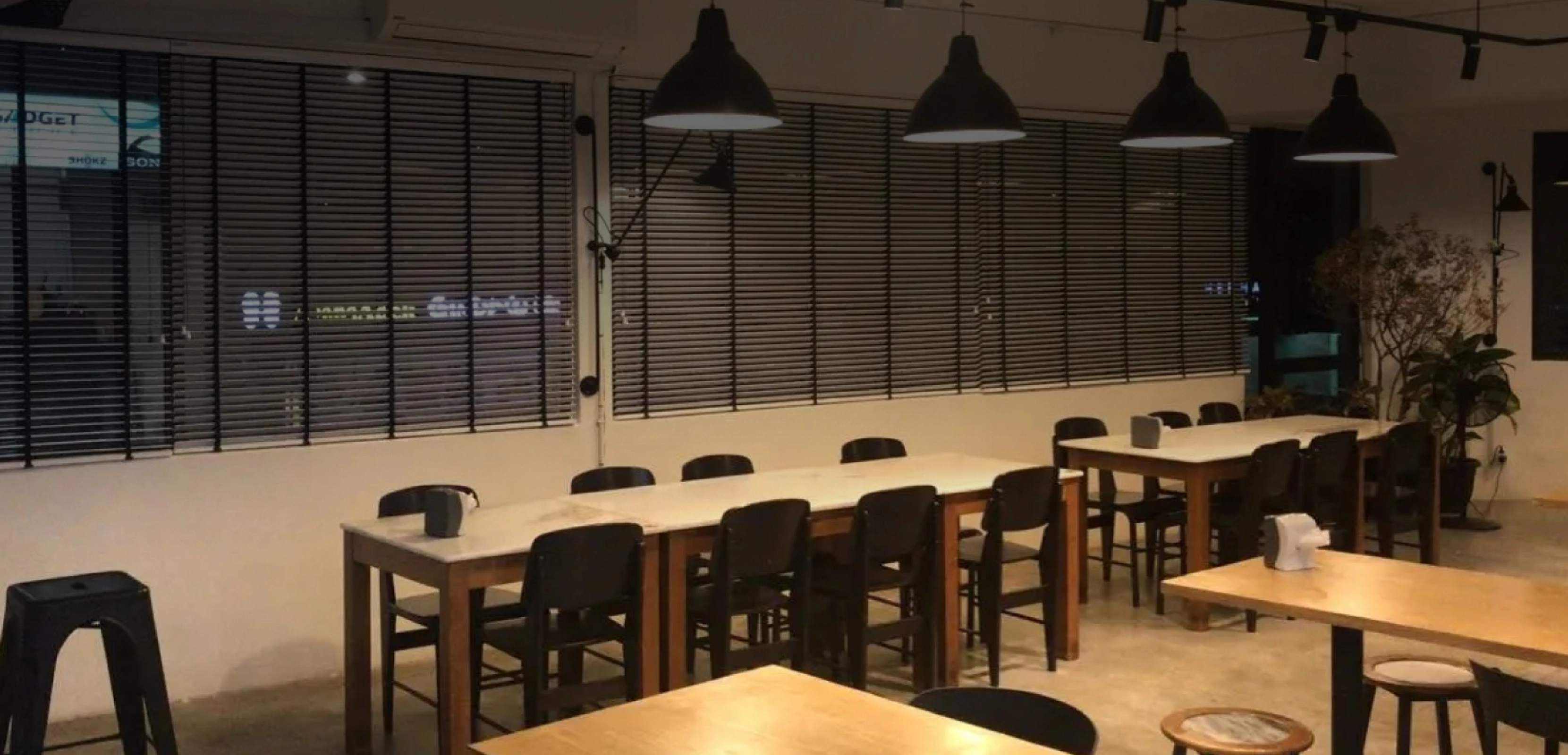 Cafe interior with venetian blinds